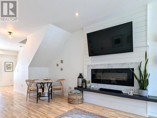 6 - 369 Essa Road, Barrie, ON - Indoor Photo Showing Living Room With Fireplace