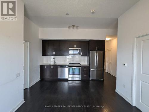 Lph03 - 8 Nahani Way, Mississauga, ON - Indoor Photo Showing Kitchen With Stainless Steel Kitchen