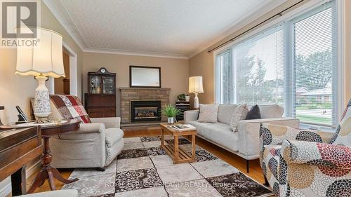 81 Queen Street, Thames Centre (Dorchester), ON - Indoor Photo Showing Living Room With Fireplace