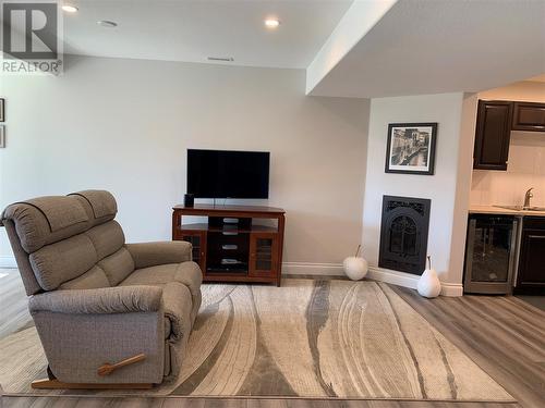 573 Spruceview Place N, Kelowna, BC - Indoor Photo Showing Living Room With Fireplace