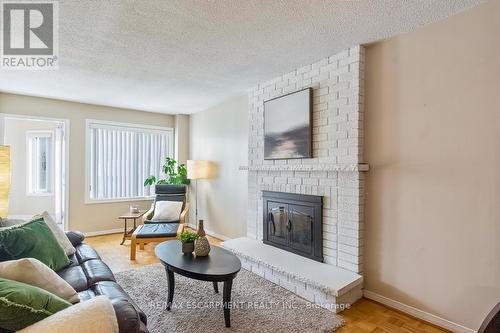 1266 Dexter Crescent, Mississauga, ON - Indoor Photo Showing Living Room With Fireplace