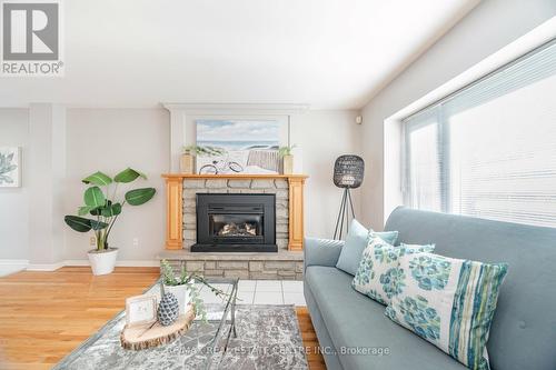 19 Oakwood Avenue N, Mississauga, ON - Indoor Photo Showing Living Room With Fireplace