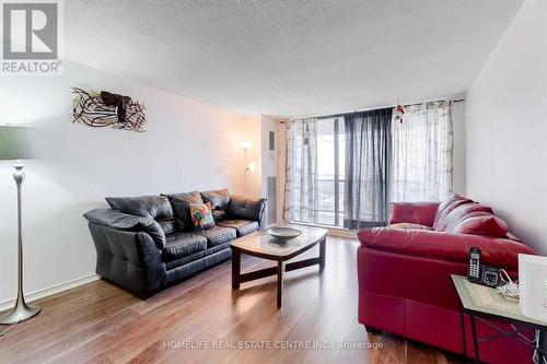 1210 - 21 Knightsbridge Road, Brampton, ON - Indoor Photo Showing Living Room