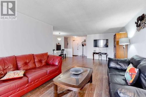 1210 - 21 Knightsbridge Road, Brampton, ON - Indoor Photo Showing Living Room