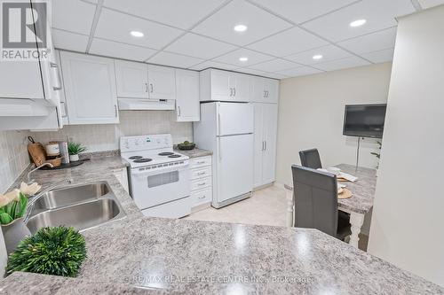 502 - 20 Mcfarlane Drive, Halton Hills, ON - Indoor Photo Showing Kitchen With Double Sink