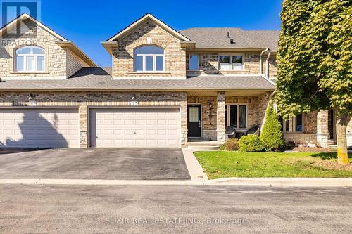 7 - 310 Southbrook Drive, Hamilton, ON - Outdoor With Facade