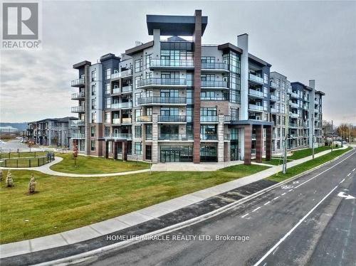 513 - 600 North Service Road, Hamilton, ON - Outdoor With Balcony With Facade