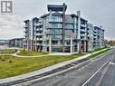 513 - 600 North Service Road, Hamilton, ON  - Outdoor With Balcony With Facade 