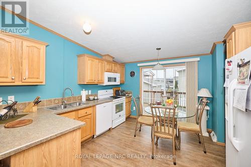 260 - 3033 Townline Road, Fort Erie (327 - Black Creek), ON - Indoor Photo Showing Kitchen With Double Sink