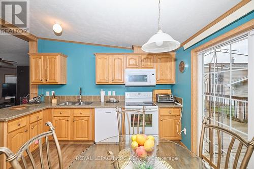 260 - 3033 Townline Road, Fort Erie (327 - Black Creek), ON - Indoor Photo Showing Kitchen With Double Sink