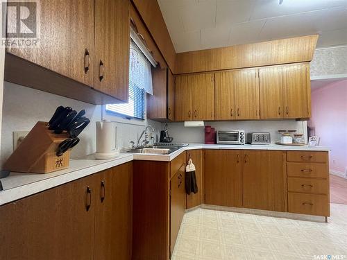 217 Maple Street, Maple Creek, SK - Indoor Photo Showing Kitchen With Double Sink