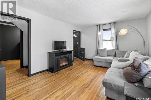 221 Taylor Street W, Saskatoon, SK - Indoor Photo Showing Living Room With Fireplace