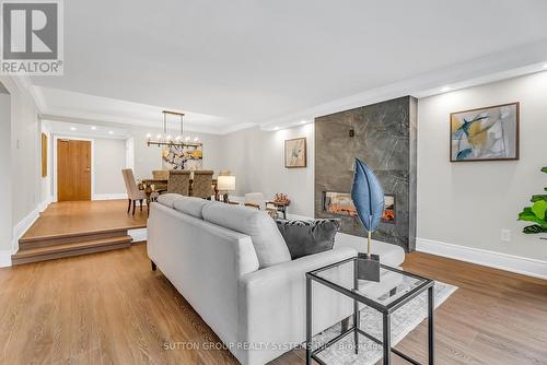 604 - 2170 Marine Drive, Oakville, ON - Indoor Photo Showing Living Room With Fireplace