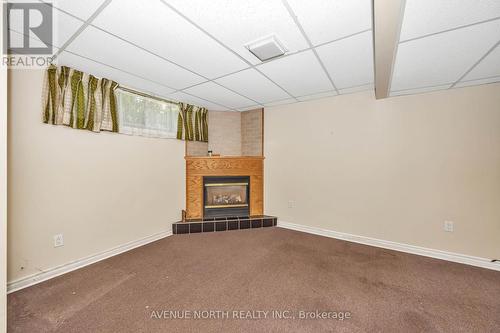 213 Ancaster Avenue, Ottawa, ON - Indoor Photo Showing Other Room With Fireplace