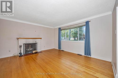 213 Ancaster Avenue, Ottawa, ON - Indoor Photo Showing Living Room With Fireplace