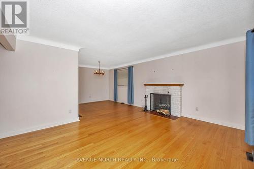 213 Ancaster Avenue, Ottawa, ON - Indoor Photo Showing Living Room With Fireplace