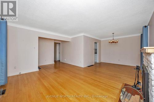 213 Ancaster Avenue, Ottawa, ON - Indoor Photo Showing Other Room With Fireplace