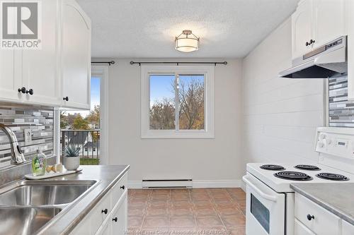 120 Pickering Unit# 507, Amherstburg, ON - Indoor Photo Showing Kitchen With Double Sink