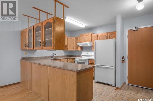 301 255 7Th Street E, Prince Albert, SK - Indoor Photo Showing Kitchen With Double Sink