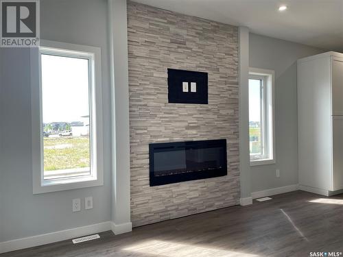 503 Myles Heidt Manor, Saskatoon, SK - Indoor Photo Showing Living Room With Fireplace