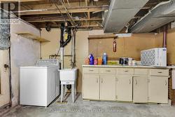 Laundry and workshop with walk-up to backyard - 