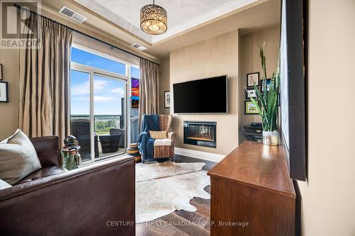 1306 - 240 Villagewalk Boulevard, London, ON - Indoor Photo Showing Living Room With Fireplace