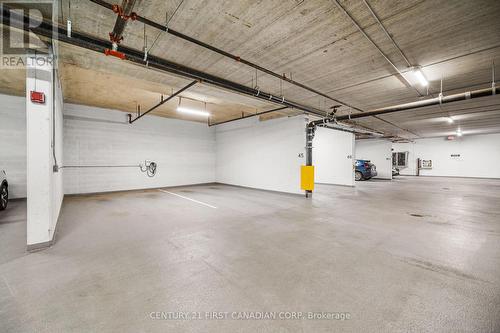 1306 - 240 Villagewalk Boulevard, London, ON - Indoor Photo Showing Garage