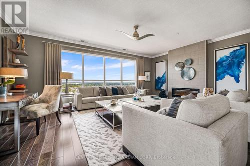 1306 - 240 Villagewalk Boulevard, London, ON - Indoor Photo Showing Living Room With Fireplace