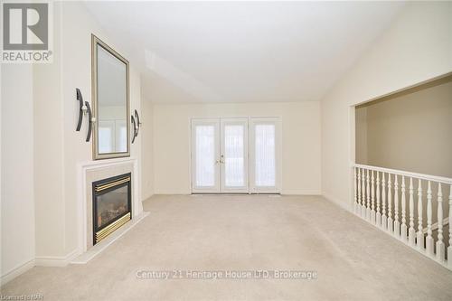 14 - 630 Albert Street, Fort Erie (333 - Lakeshore), ON - Indoor Photo Showing Other Room With Fireplace