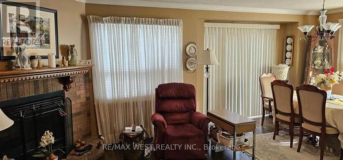 6 - 3600 Colonial Drive, Mississauga, ON - Indoor With Fireplace