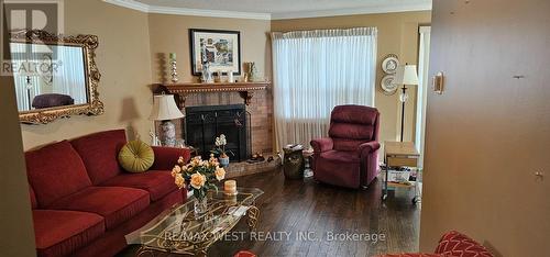 6 - 3600 Colonial Drive, Mississauga, ON - Indoor Photo Showing Living Room With Fireplace