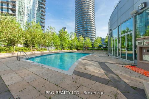 120 - 70 Absolute Avenue, Mississauga, ON - Outdoor With In Ground Pool