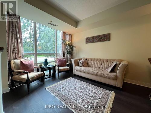 120 - 70 Absolute Avenue, Mississauga, ON - Indoor Photo Showing Living Room