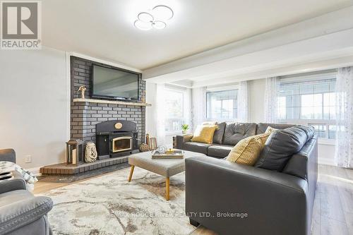 81 Laird Drive, Kawartha Lakes, ON - Indoor Photo Showing Living Room With Fireplace