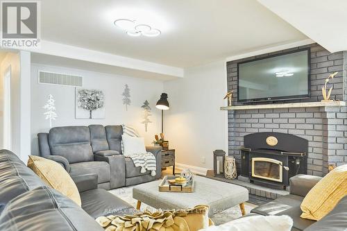 81 Laird Drive, Kawartha Lakes, ON - Indoor Photo Showing Living Room With Fireplace