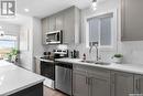 539 Myles Heidt Manor, Saskatoon, SK  - Indoor Photo Showing Kitchen With Stainless Steel Kitchen With Double Sink 