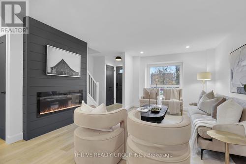 7 - 226 Highview Avenue W, London, ON - Indoor Photo Showing Living Room With Fireplace