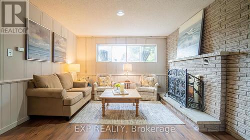 335 North Forest Crescent, Orillia, ON - Indoor Photo Showing Living Room With Fireplace