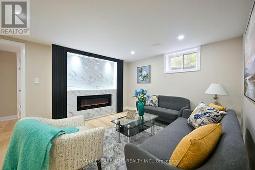 75 Randall Avenue, Hamilton, ON - Indoor Photo Showing Living Room With Fireplace