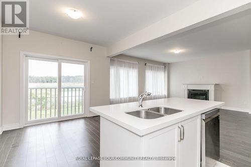 27 Lorne Thomas Place, New Tecumseth, ON - Indoor Photo Showing Kitchen With Double Sink