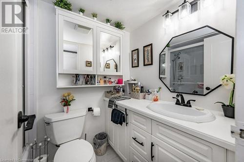 Bathroom with tile patterned flooring, vanity, toilet, and a shower with shower door - 3100 Kirwin Avenue Unit# 2102, Mississauga, ON - Indoor Photo Showing Bathroom