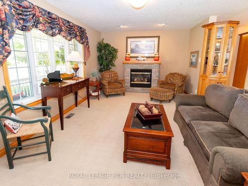 101 Conservation Tr, Centre Wellington, ON - Indoor Photo Showing Living Room With Fireplace