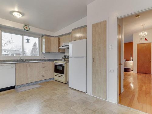 Cuisine - 8430 Rue Adrien, Laval (Saint-François), QC - Indoor Photo Showing Kitchen With Double Sink