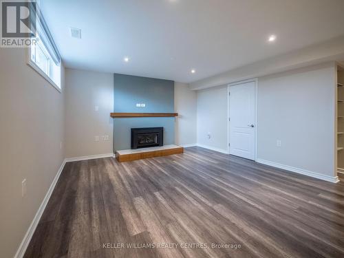 Lower - 177 Frederick Street, Bradford West Gwillimbury, ON - Indoor Photo Showing Living Room With Fireplace