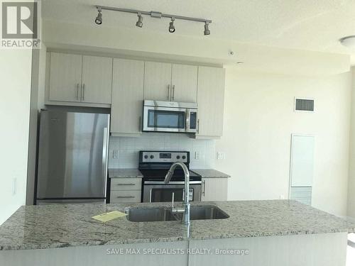 704 - 3975 Grand Park Drive, Mississauga, ON - Indoor Photo Showing Kitchen With Stainless Steel Kitchen With Double Sink With Upgraded Kitchen