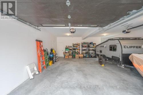 24 Ted'S Lane, Galway-Cavendish And Harvey, ON - Indoor Photo Showing Garage