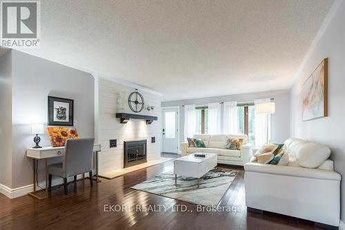 24 Kaiser Court, Belleville, ON - Indoor Photo Showing Living Room With Fireplace