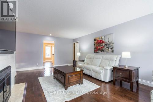 24 Kaiser Court, Belleville, ON - Indoor Photo Showing Living Room With Fireplace