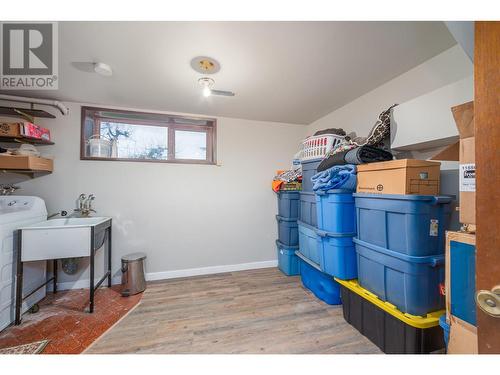 Great sized laundry room with lots of storage - 2308 Thacker Drive, West Kelowna, BC - Indoor Photo Showing Laundry Room