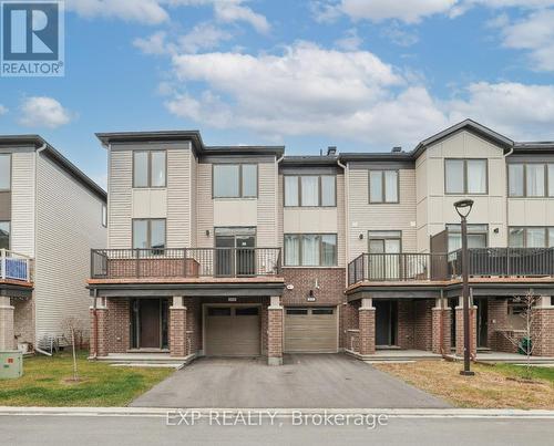 231 Anyolite, Ottawa, ON - Outdoor With Balcony With Facade